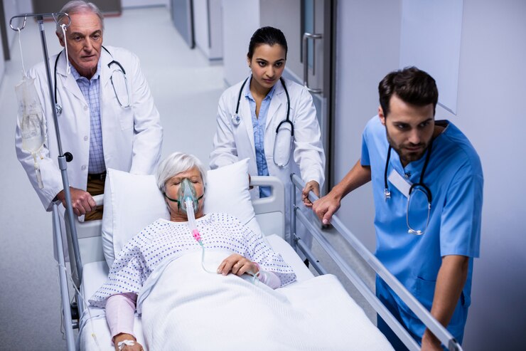 doctor-nurse-pushing-emergency-stretcher-bed-corridor_107420-51314.jpg